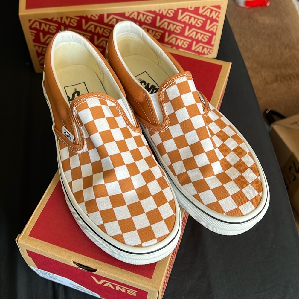 Vans checkered slip ons